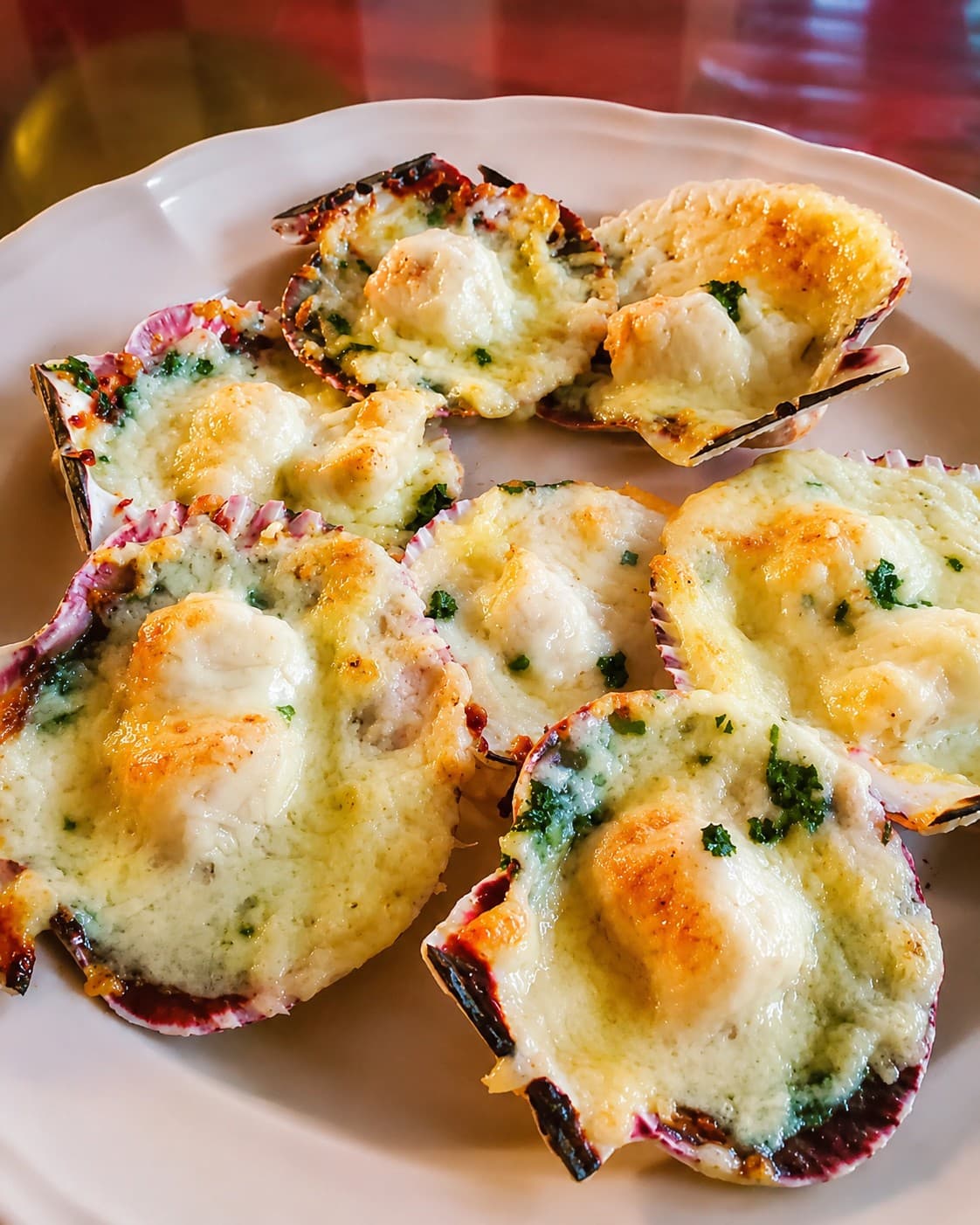 Conchitas a la parmesana prepared by Maria Mosquera.